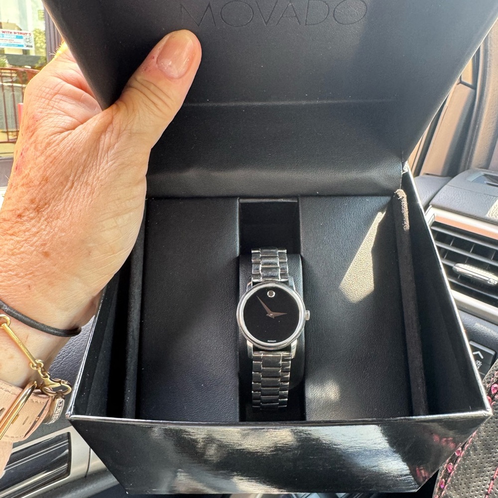 Movado silver watch gently used